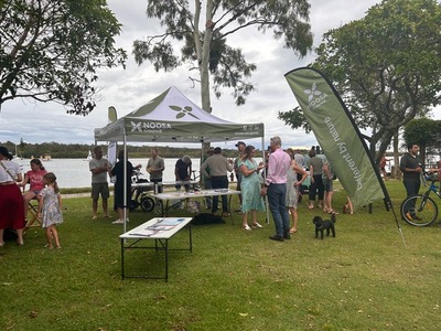 Image of Noosa Council staff talking to the community at a community engagement event